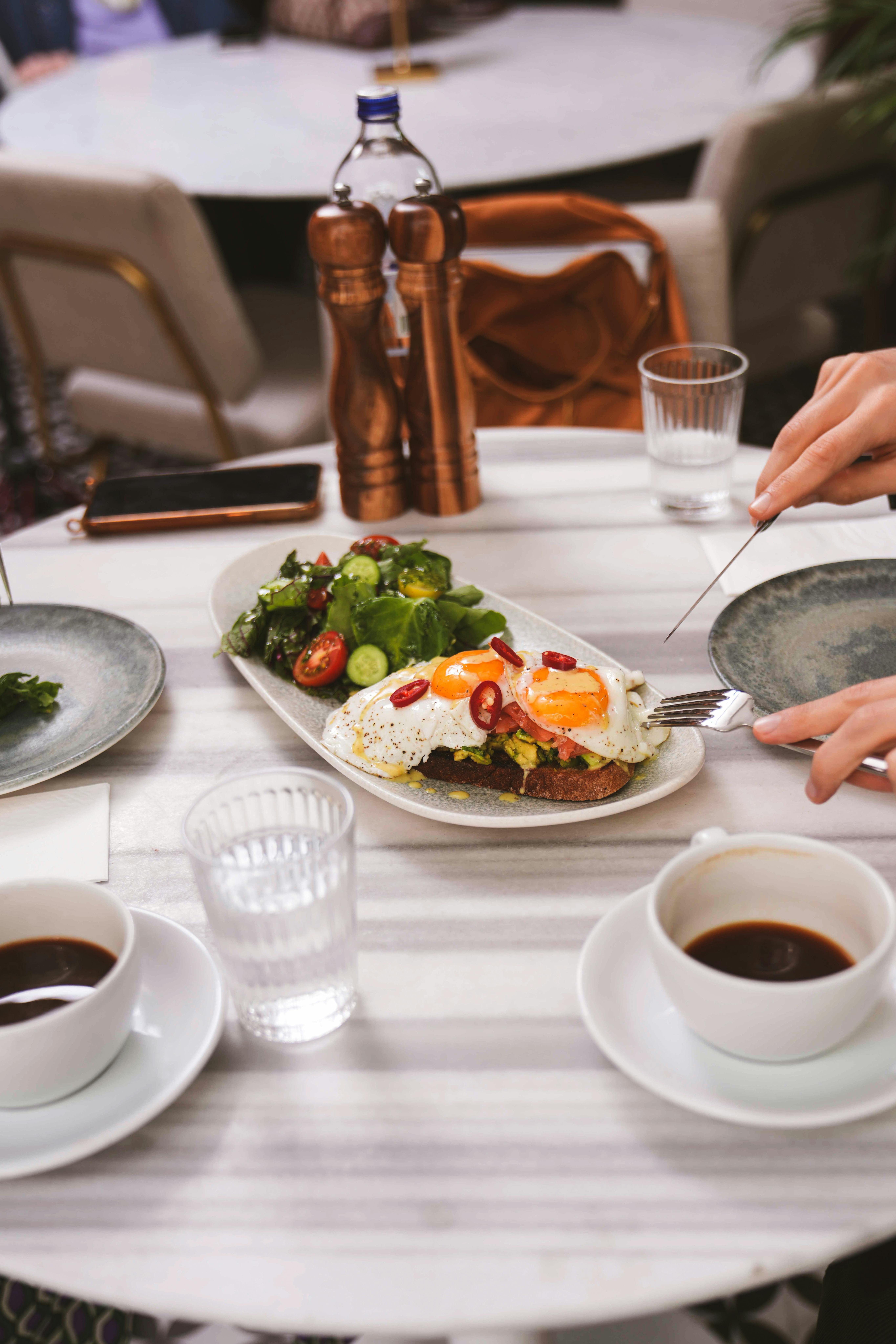 raw cacao powder and nibs in bowls organic nutrition, healthy eating tips, clean eating recipes, whole food plant-based