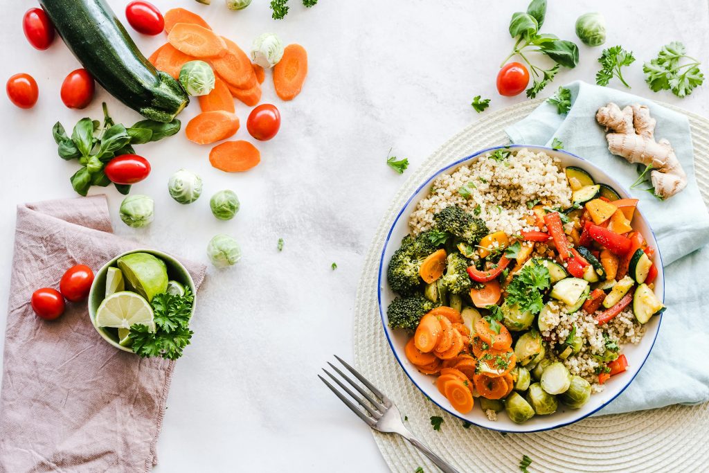 hands holding a basket of farm produce organic nutrition, healthy eating tips, clean eating recipes, whole food plant-based